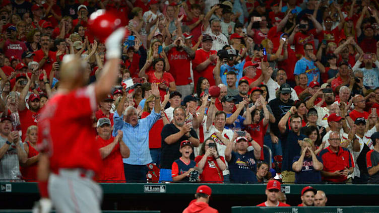 Jun 23, 2019; St. Louis, MO, USA; Los Angeles Angels first baseman Albert Pujols (5) salutes the fans as he receives a standing ovation during the ninth inning against the St. Louis Cardinals at Busch Stadium. Mandatory Credit: Jeff Curry-USA TODAY Sports