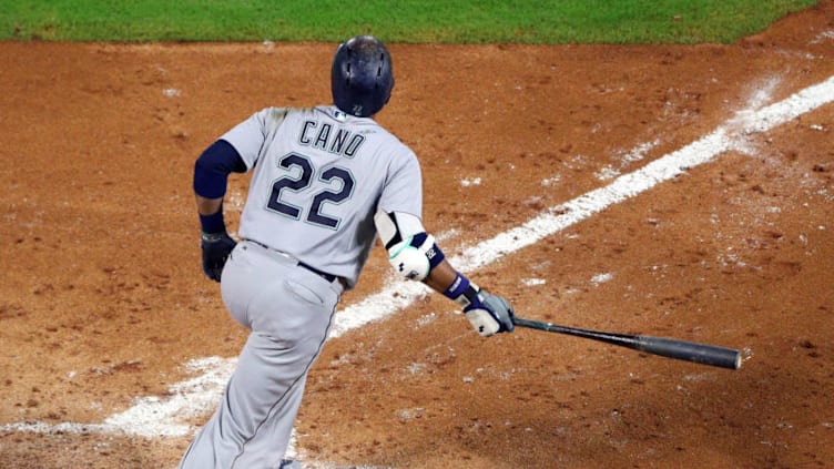 ARLINGTON, TX - SEPTEMBER 22: Robinson Cano #22 of the Seattle Mariners watches his three-run home run shot against the Texas Rangers in the fourth inning at Globe Life Park in Arlington on September 22, 2018 in Arlington, Texas. (Photo by Richard Rodriguez/Getty Images)