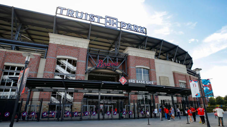 ATLANTA, GA - OCTOBER 08: Atlanta Braves fans enter Truist Park to watch Game Three of the National League Division Series between the Miami Marlins and Atlanta Braves at Truist Park on October 8, 2020 in Atlanta, Georgia. (Photo by Todd Kirkland/Getty Images)