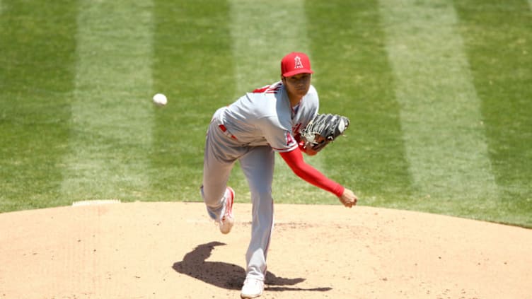 OAKLAND, CALIFORNIA - JULY 26: Shohei Ohtani #17 of the Los Angeles Angels pitches against the Oakland Athletics in the first inning at Oakland-Alameda County Coliseum on July 26, 2020 in Oakland, California. The 2020 season had been postponed since March due to the COVID-19 pandemic. (Photo by Ezra Shaw/Getty Images)