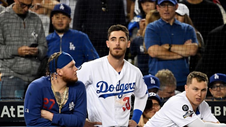 LOS ANGELES, CA - October 9: Cody Bellinger #35, center, along with teammates Alex verdugo #27, left, and Joc Pederson #31 of the Los Angeles Dodgers look on against the Washington Nationals in the eighth inning of game five of the National League Division Series at Dodger Stadium on Wednesday, Oct. 09, 2019 in Los Angeles, California. (Photo by Keith Birmingham, Pasadena Star-News/SCNG}