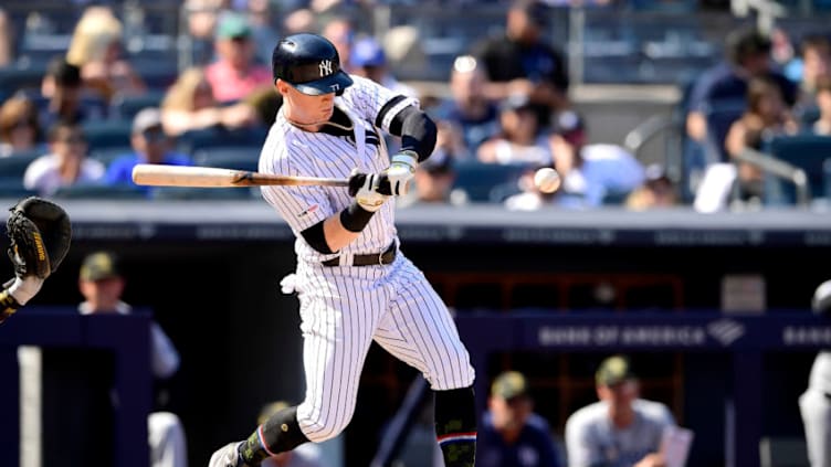 NEW YORK, NEW YORK - MAY 19: Clint Frazier #77 of the New York Yankees swings at a pitch against the Tampa Bay Rays at Yankee Stadium on May 19, 2019 in New York City. (Photo by Steven Ryan/Getty Images)