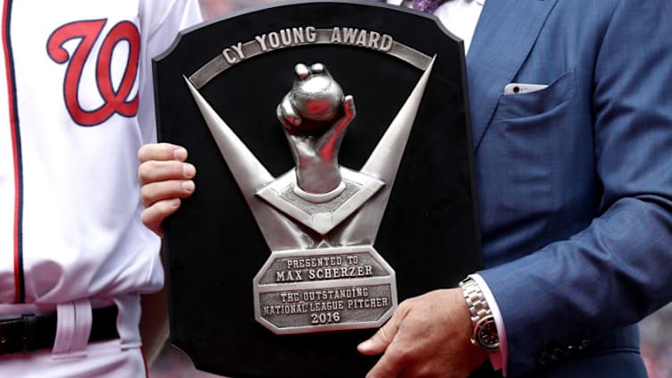 WASHINGTON, DC - APRIL 03: The 2016 National League Cy Young Award is presented to Max Scherzer #32 of the Washington Nationals before the start of the Opening Day game against the Miami Marlins on April 3, 2017 at Nationals Park in Washington, DC. The Nationals won 4-2. (Photo by Win McNamee/Getty Images)