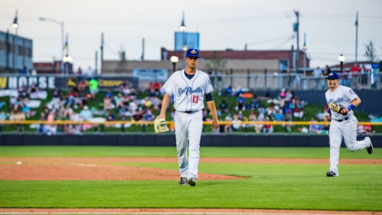 AMARILLO, TEXAS - AUGUST 02: Pitcher MacKenzie Gore #13 of the Amarillo Sod Poodles walks off the mound between innings against the Northwest Arkansas Naturals at HODGETOWN Stadium on August 02, 2019 in Amarillo, Texas. (Photo by John E. Moore III/Getty Images)