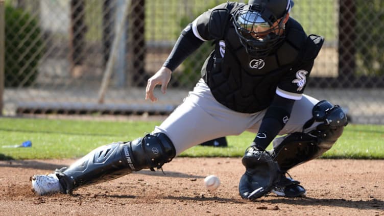 GLENDALE, ARIZONA - FEBRUARY 18: Yasmani Grandal #24 of the Chicago White Sox catches during spring training workouts on February 18, 2020at Camelback Ranch in Glendale Arizona. (Photo by Ron Vesely/Getty Images)