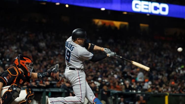 SAN FRANCISCO, CA - SEPTEMBER 14: Miguel Rojas #19 of the Miami Marlins hits an RBI double against the San Francisco Giants during the eighth inning at Oracle Park on September 14, 2019 in San Francisco, California. The Miami Marlins defeated the San Francisco Giants 4-2. (Photo by Jason O. Watson/Getty Images)