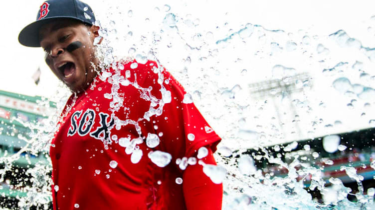 BOSTON, MA - AUGUST 18: Rafael Devers #11 of the Boston Red Sox reacts as he is doused with Gatorade after a game against the Baltimore Orioles on August 18, 2019 at Fenway Park in Boston, Massachusetts. (Photo by Billie Weiss/Boston Red Sox/Getty Images)