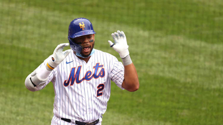 NEW YORK, NEW YORK - AUGUST 13: Dominic Smith #2 of the New York Mets celebrates his second inning home run against Austin Voth #50 of the Washington Nationals during their game at Citi Field on August 13, 2020 in New York City. (Photo by Al Bello/Getty Images)