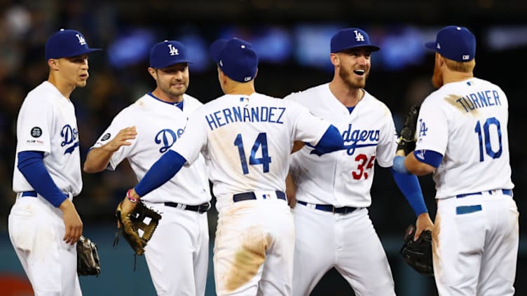 LOS ANGELES, CALIFORNIA - APRIL 02: Corey Seager #5, A.J. Pollock #11, Kike Hernandez #14, Cody Bellinger #35 and Justin Turner #10 of the Los Angeles Dodgers celebrate the game-ending double play against the San Francisco Giants at Dodger Stadium on April 02, 2019 in Los Angeles, California. (Photo by Yong Teck Lim/Getty Images)