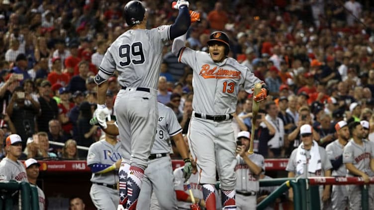 WASHINGTON, DC - JULY 17: Aaron Judge #99 of the New York Yankees and the American League celebrates with Manny Machado #13 of the Baltimore Orioles and the American League after hitting a solo home run in the second inning against the National League during the 89th MLB All-Star Game, presented by Mastercard at Nationals Park on July 17, 2018 in Washington, DC. (Photo by Patrick Smith/Getty Images)