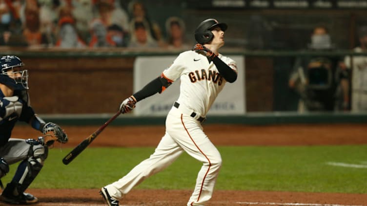 SAN FRANCISCO, CALIFORNIA - SEPTEMBER 09: Mike Yastrzemski #5 of the San Francisco Giants hits a three-run home run in the bottom of the third inning against the Seattle Mariners at Oracle Park on September 09, 2020 in San Francisco, California. (Photo by Lachlan Cunningham/Getty Images)