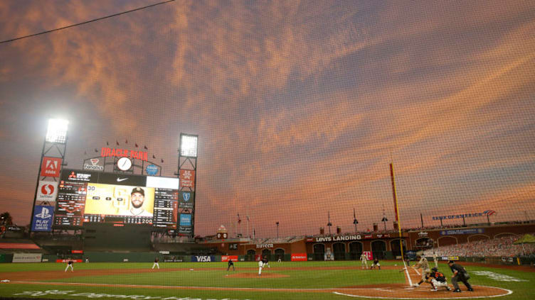 SAN FRANCISCO, CALIFORNIA - SEPTEMBER 26: Eric Hosmer #30 of the San Diego Padres hits a single in the top of the fourth inning against the San Francisco Giants at Oracle Park on September 26, 2020 in San Francisco, California. (Photo by Lachlan Cunningham/Getty Images)