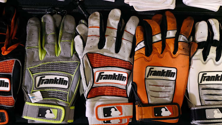 PHOENIX, AZ - SEPTEMBER 25: An assortment of Franklin batting gloves inside the San Francisco Giants dugout during a MLB game against the Arizona Diamondbacks at Chase Field on September 25, 2017 in Phoenix, Arizona. The Giants defeated the Diamondbacks 9-2. (Photo by Ralph Freso/Getty Images)