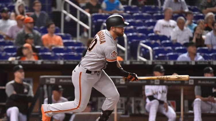 MIAMI, FL - JUNE 11: Evan Longoria #10 of the San Francisco Giants hits an RBI single in the third inning against the Miami Marlins at Marlins Park on June 11, 2018 in Miami, Florida. (Photo by Eric Espada/Getty Images)