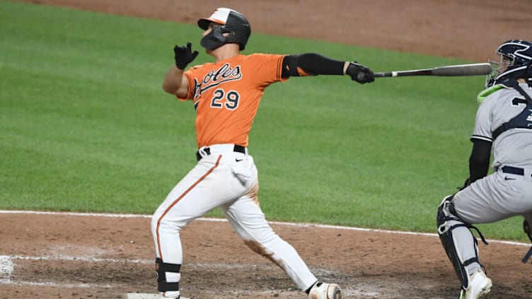 BALTIMORE, MD - JULY 23: Ramon Urias #29 of the Baltimore Orioles hits a two run home run in the eight inning during a baseball game against the New York Yankees at Oriole Park at Camden Yards on July 23, 2022 in Baltimore, Man. (Photo by Mitchell Layton/Getty Images)