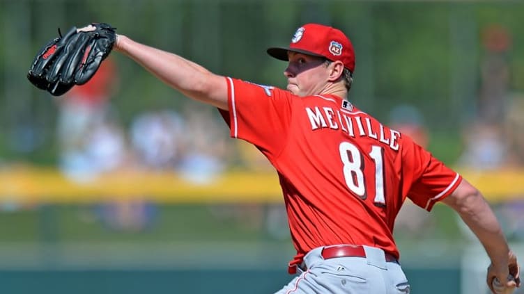 Mar 19, 2016; Mesa, AZ, USA; Cincinnati Reds starting pitcher Tim Melville (81) pitches during the third inning against the Oakland Athletics at HoHoKam Stadium. Mandatory Credit: Jake Roth-USA TODAY Sports