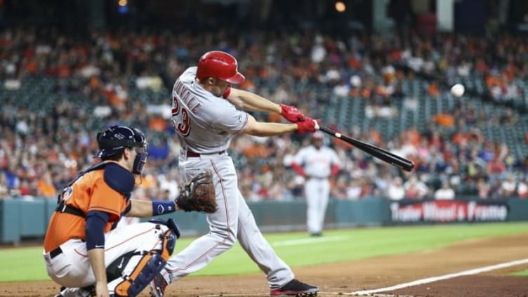 Jun 17, 2016; Houston, TX, USA; Cincinnati Reds left fielder Adam Duvall (23) hits a triple during the second inning against the Houston Astros at Minute Maid Park. Mandatory Credit: Troy Taormina-USA TODAY Sports