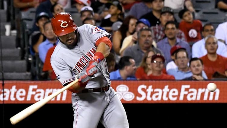 Aug 30, 2016; Anaheim, CA, USA; Cincinnati Reds third baseman Eugenio Suarez (7) hits a two run home in the seventh inning of the game against the Los Angeles Angels at Angel Stadium of Anaheim. Mandatory Credit: Jayne Kamin-Oncea-USA TODAY Sports