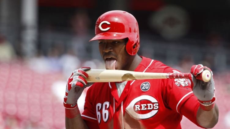 CINCINNATI, OH - APRIL 11: Yasiel Puig #66 of the Cincinnati Reds licks his bat after fouling off a pitch in the seventh inning against the Miami Marlins at Great American Ball Park on April 11, 2019 in Cincinnati, Ohio. The Reds won 5-0. (Photo by Joe Robbins/Getty Images)