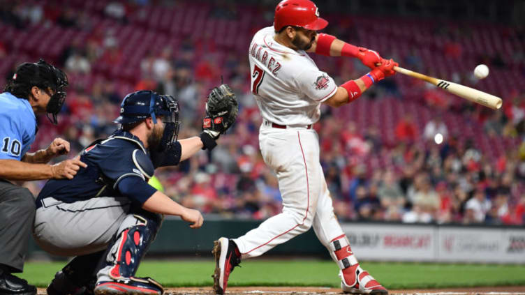 CINCINNATI, OH - APRIL 25: Eugenio Suarez #7 of the Cincinnati Reds hits a two-run double in the fifth inning against the Atlanta Braves. (Photo by Jamie Sabau/Getty Images)