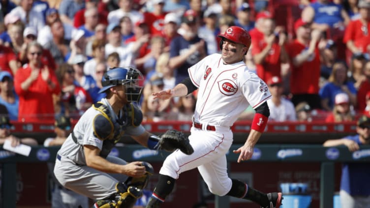 CINCINNATI, OH - MAY 18: Joey Votto #19 of the Cincinnati Reds heads toward the plate to score. (Photo by Joe Robbins/Getty Images)