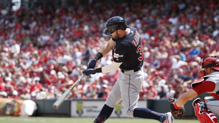 CINCINNATI, OH - JULY 07: Tyler Naquin #30 of the Cleveland Indians hits a single to right field to drive in a run in the eighth inning against the Cincinnati Reds at Great American Ball Park. (Photo by Joe Robbins/Getty Images)