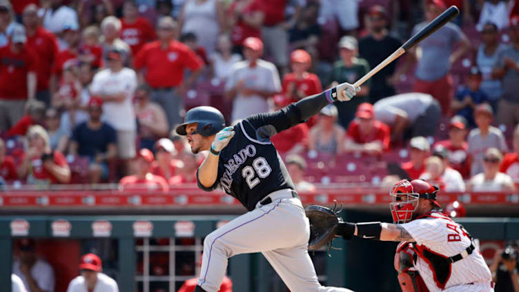 CINCINNATI, OH - JULY 28: Nolan Arenado #28 of the Colorado Rockies bats during a game against the Cincinnati Reds. (Photo by Joe Robbins/Getty Images)