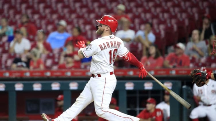 CINCINNATI, OHIO - AUGUST 06: Tucker Barnhart #16 of the Cincinnati Reds hits a home run in the 8th inning against the Los Angeles Angels of Anaheim at Great American Ball Park on August 06, 2019 in Cincinnati, Ohio. (Photo by Andy Lyons/Getty Images)