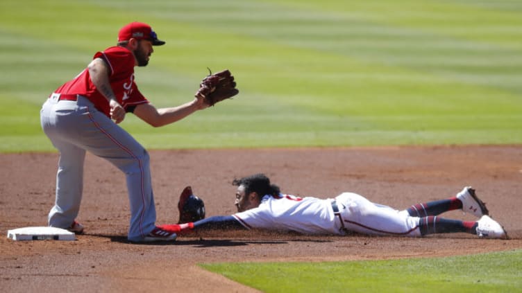 ATLANTA, GA - SEPTEMBER 30: Ozzie Albies #1 steals second base in the second inning of Game One of the National League Wild Card Series against the Cincinnati Reds. (Photo by Todd Kirkland/Getty Images)