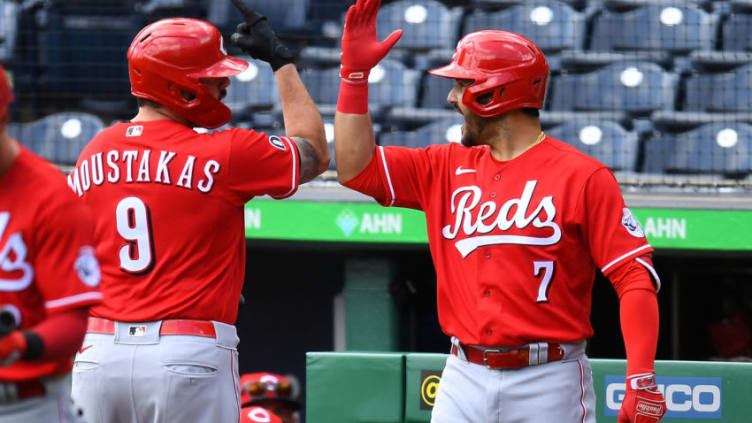 PITTSBURGH, PA - MAY 12: Mike Moustakas #9 of the Cincinnati Reds celebrates his solo home run with Eugenio Suarez #7 during the second inning. (Photo by Joe Sargent/Getty Images)