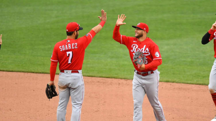 PITTSBURGH, PA - MAY 12: Nick Senzel #15 celebrates with Eugenio Suarez #7 of the Cincinnati Reds after a 5-1 win over the Pittsburgh Pirates at PNC Park on May 12, 2021 in Pittsburgh, Pennsylvania. (Photo by Joe Sargent/Getty Images)