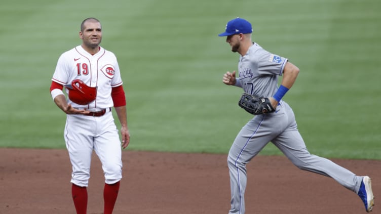 CINCINNATI, OH - AUGUST 11: Joey Votto #19 of the Cincinnati Reds looks on as Hunter Dozier #17 of the Kansas City Royals heads to the dugout . (Photo by Joe Robbins/Getty Images)