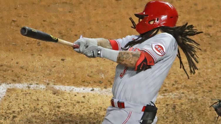 CHICAGO, ILLINOIS - SEPTEMBER 09: Freddy Galvis #3 of the Cincinnati Reds hits a single. (Photo by Jonathan Daniel/Getty Images)