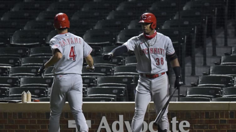 CHICAGO, ILLINOIS - SEPTEMBER 10: Shogo Akiyama #4 of the Cincinnati Reds celebrates with Jose Garcia #38 of the Cincinnati Reds after scoring in the second inning. (Photo by Quinn Harris/Getty Images)