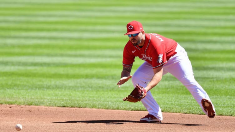 CINCINNATI, OH - SEPTEMBER 20: Mike Moustakas #9 of the Cincinnati Reds fields a ground ball. (Photo by Jamie Sabau/Getty Images)