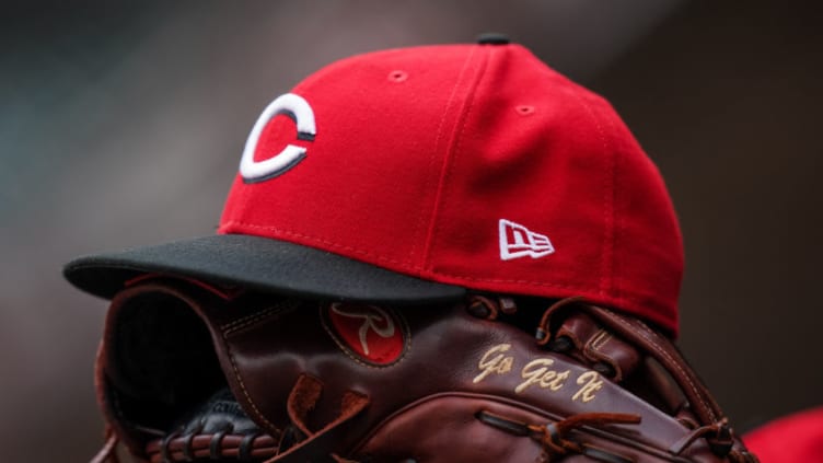 MINNEAPOLIS, MN - SEPTEMBER 27: A detail view of a Cincinnati Reds red and glove against the Minnesota Twins. (Photo by Brace Hemmelgarn/Minnesota Twins/Getty Images) *** Local Caption ***