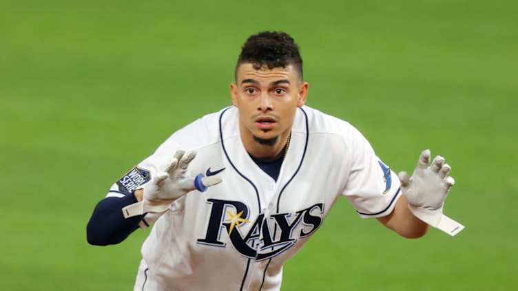 ARLINGTON, TEXAS - OCTOBER 23: Willy Adames #1 of the Tampa Bay Rays celebrates after hitting an RBI double. (Photo by Ronald Martinez/Getty Images)