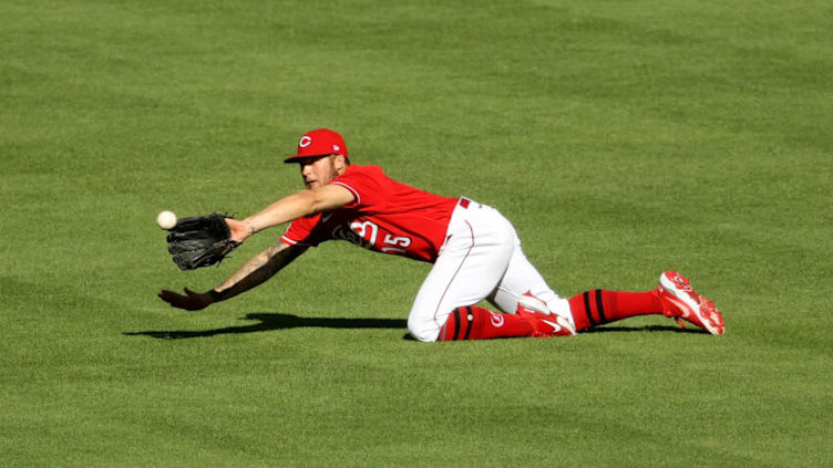 CINCINNATI, OHIO - MAY 01: Nick Senzel #15 of the Cincinnati Reds dives to make a catch. (Photo by Dylan Buell/Getty Images)