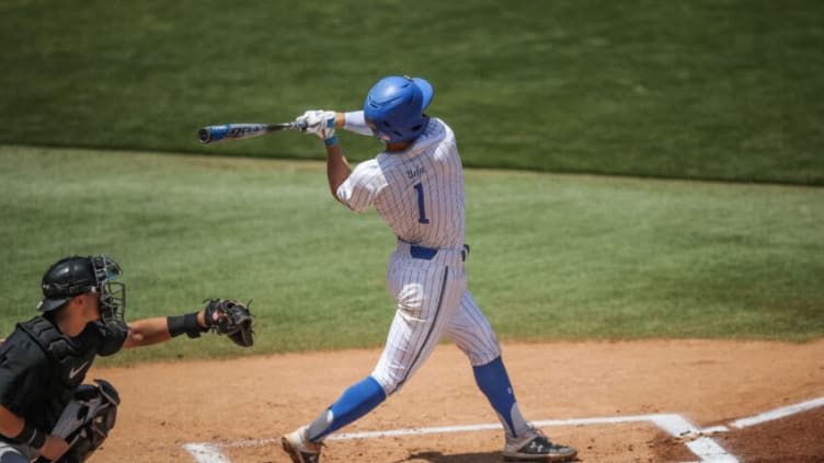 LOS ANGELES, CALIFORNIA - MAY 02: Matt McLain #1 of UCLA swings the bat. (Photo by Andy Bao/Getty Images)