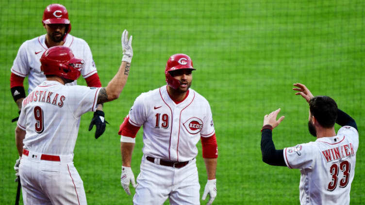 CINCINNATI, OHIO - APRIL 30: Joey Votto #19 of the Cincinnati Reds celebrates his 300th career home run. (Photo by Emilee Chinn/Getty Images)