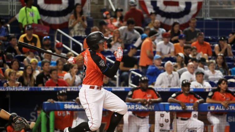 MIAMI, FL - JULY 09: Nick Senzel #13 of the Cincinnati Reds and the U.S. Team hits an RBI double in the first inning against the World Team during the SiriusXM All-Star Futures Game at Marlins Park on July 9, 2017 in Miami, Florida. (Photo by Mike Ehrmann/Getty Images)