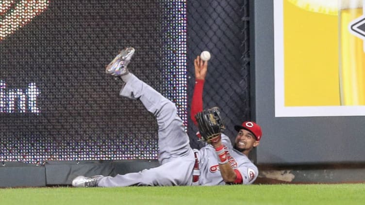 KANSAS CITY, MO - JUNE 13: Billy Hamilton #6 of the Cincinnati Reds makes a play against the Kansas City Royals during the ninth inning at Kauffman Stadium on June 13, 2018 in Kansas City, Missouri. (Photo by Brian Davidson/Getty Images)