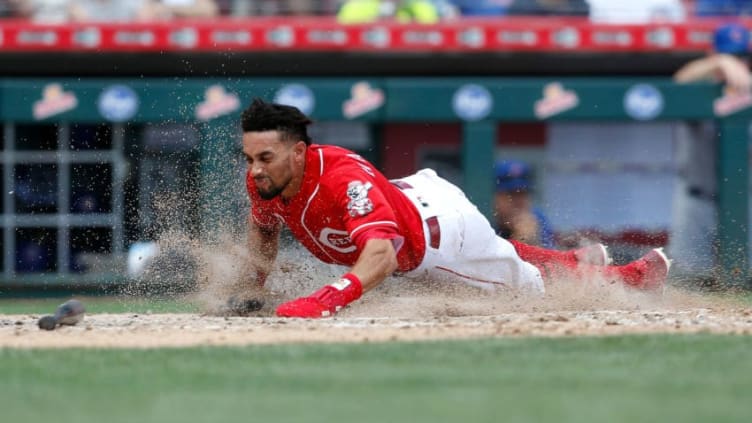 CINCINNATI, OH - JUNE 24: Billy Hamilton #6 of the Cincinnati Reds slides into home to score a run during the seventh inning of the game against the Chicago Cubs at Great American Ball Park on June 24, 2018 in Cincinnati, Ohio. Cincinnati defeated Chicago 8-6. (Photo by Kirk Irwin/Getty Images)