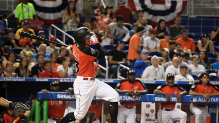 MIAMI, FL - JULY 09: Nick Senzel #13 of the Cincinnati Reds and the U.S. Team hits an RBI double in the first inning against the World Team during the SiriusXM All-Star Futures Game at Marlins Park on July 9, 2017 in Miami, Florida. (Photo by Mike Ehrmann/Getty Images)