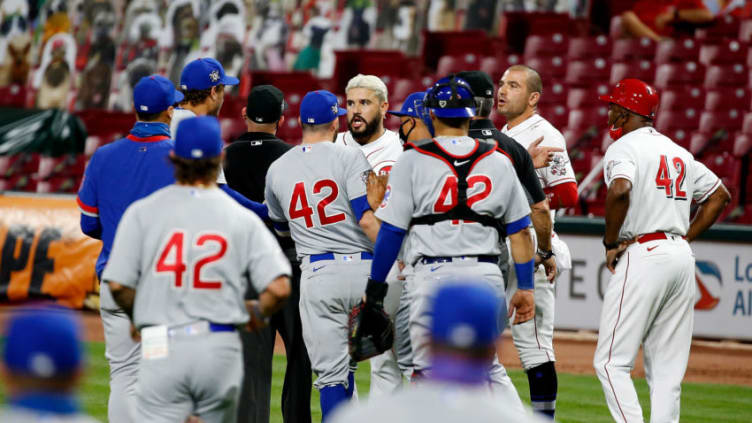 CINCINNATI, OH - AUGUST 29: Eugenio Suarez #42 of the Cincinnati Reds argues with Anthony Rizzo #42 of the Chicago Cubs causing both benches to clear during the fourth inning.(Photo by Kirk Irwin/Getty Images)