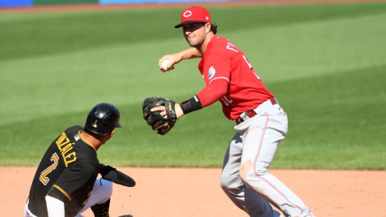 PITTSBURGH, PA - SEPTEMBER 06: Kyle Farmer #52 of the Cincinnati Reds cannot turn the second half of a double play in the eighth inning. (Photo by Justin Berl/Getty Images)