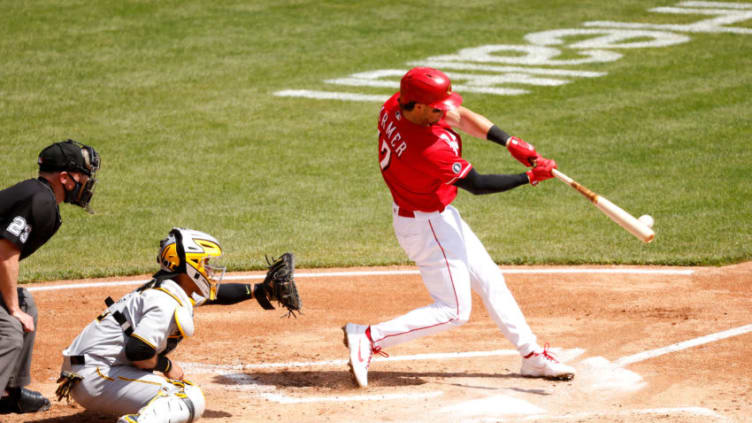 CINCINNATI, OH - APRIL 07: Kyle Farmer #17 of the Cincinnati Reds hits a two-run RBI double. (Photo by Kirk Irwin/Getty Images)