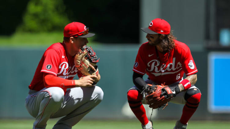 MINNEAPOLIS, MN - JUNE 22: Tyler Stephenson #37, left, talks to Jonathan India #6 of the Cincinnati Reds during a pitching change in the eighth inning of the game against the Minnesota Twins at Target Field on June 22, 2021 in Minneapolis, Minnesota. The Reds defeated the Twins 10-7. (Photo by David Berding/Getty Images)