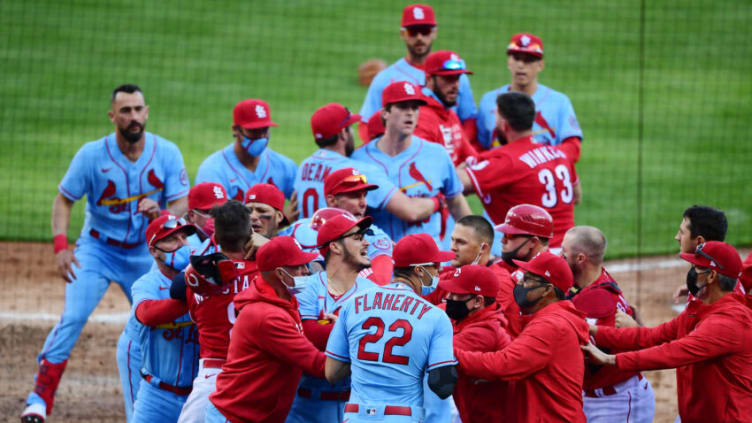 CINCINNATI, OHIO - APRIL 03: The Cincinnati Reds and St. Louis Cardinals fight. (Photo by Emilee Chinn/Getty Images)