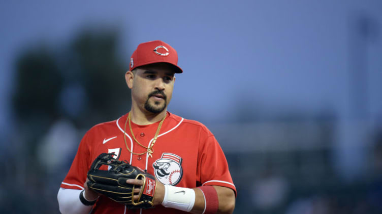 Mar 9, 2021; Goodyear, Arizona, USA; Cincinnati Reds third baseman Eugenio Suarez (7) looks on against the Los Angeles Dodgers during the third inning of a spring training game. Mandatory Credit: Joe Camporeale-USA TODAY Sports